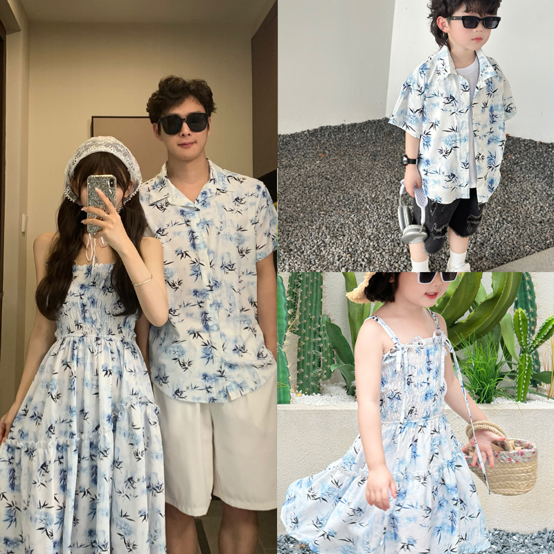 Summer Clothing Looks - Resortpaar Kijkt Ouders En Kinderen Zomerkleding